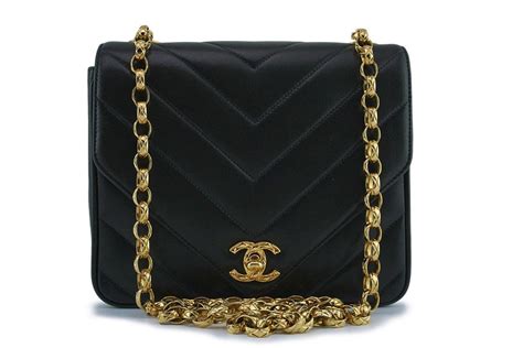 chanel box bag black|Chanel bag black gold chain.